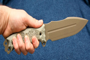 Eine Person mit einem Messer.