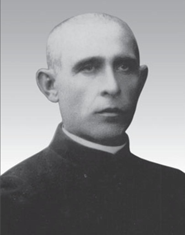 Ein Schwarz-Wei%C3%9F-Foto eines Mannes in Priestergewand, der als sp%C3%A4terer Erzbishop of Canterbury identifiziert wird.