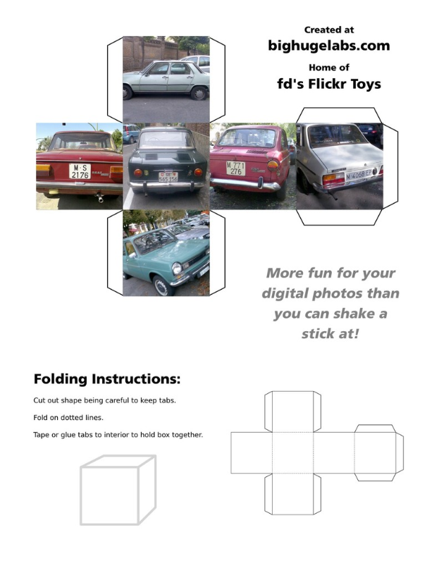 Ein Pr√§sentationsschlitten mit Fahrzeugen auf einer Stra√üe und Text darauf.