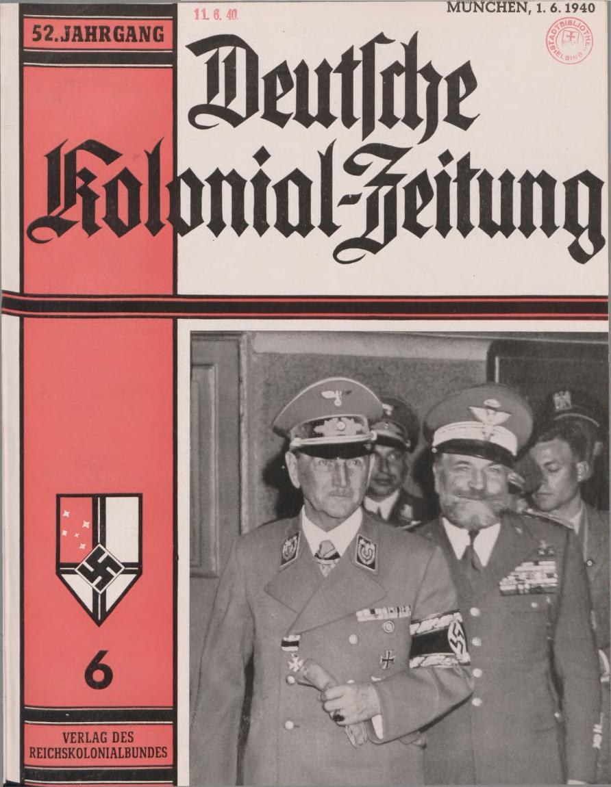 Buch mit dem Titel 'Deutsches Kolonial-Feitung' vom 11/1940 mit einem Bild von Adolf Hitler auf dem Cover, gehalten von einer Person in einer Gruppe mit Mützen.