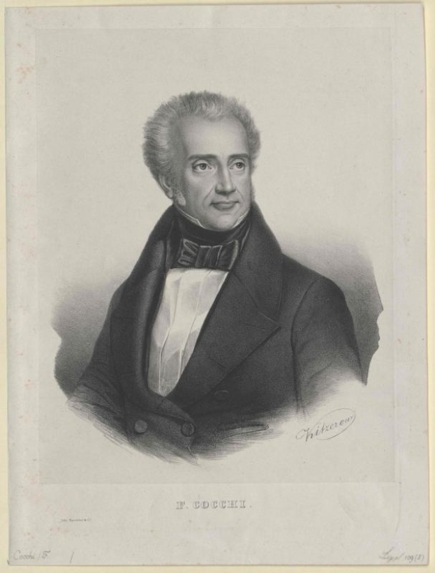 Schwarzes und weißes Porträt von F. Cocchi, Komponist der Oper, in einem Smoking mit ernstem Gesichtsausdruck, mit der Beschriftung "Die Musik der Oper" unten.