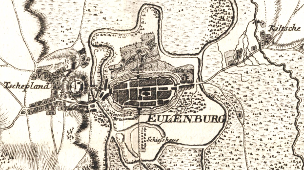 Ein detaillierter alter Stadtplan von Eulenburg, Deutschland, der Straßen, Gebäude und Sehenswürdigkeiten mit Textbeschriftungen zeigt.