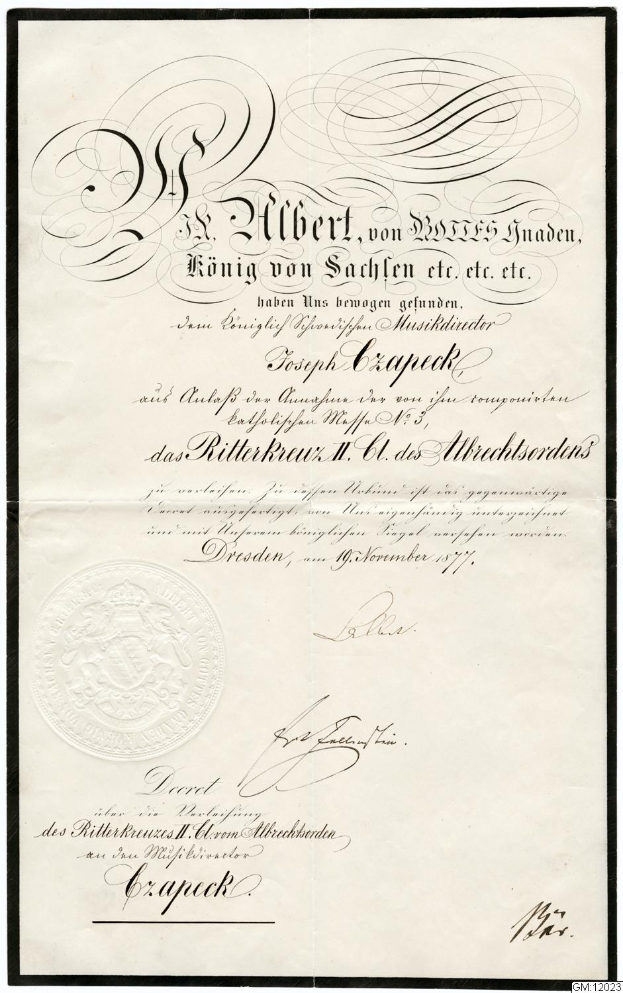 Ein altes Dokument mit schwarzem Rand und weißem Hintergrund, das den Text 'Ritterkreuz II, Dresden, Deutschland' und ein Logo der deutschen Regierung zeigt.